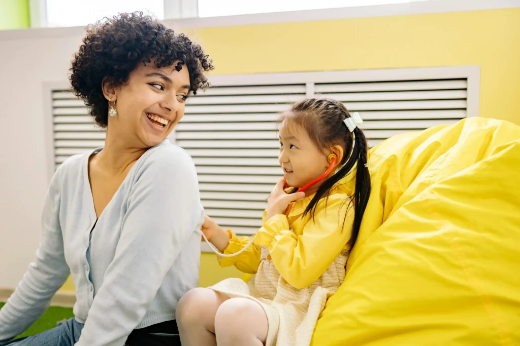 A child and her doctor.